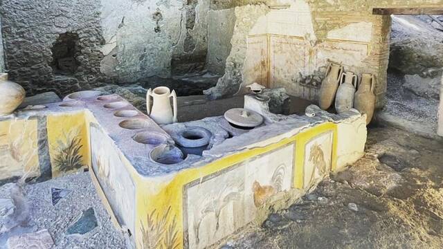 Arque�logos encuentran evidencias del 'McDonald's' del imperio romano escondidas en un pozo desde hace 2.000 a�os en Mallorca